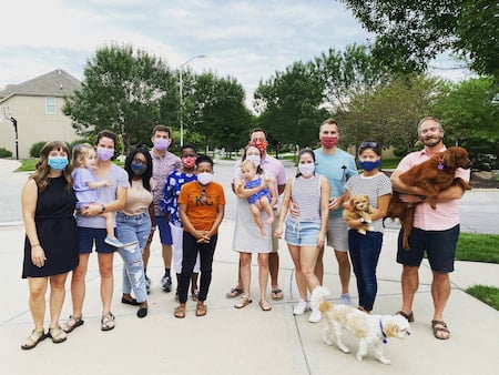 Children's Mercy Pediatric Residents pose with family members and pets.