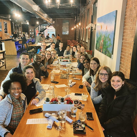 Children's Mercy Pediatric Residents enjoy a meal together at a restaurant